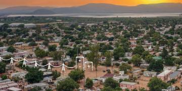 African cityscape with drawings indicating the creation of renewable energy access infrastructure.